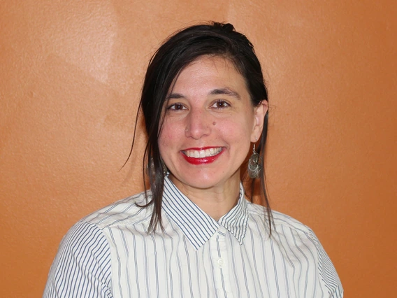Woman with white shirt smiling
