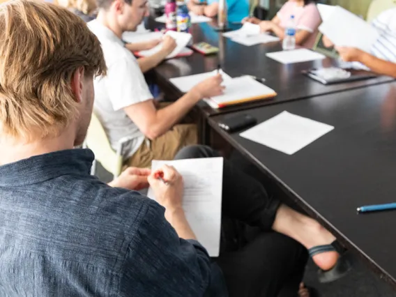 Students engage in group writing session