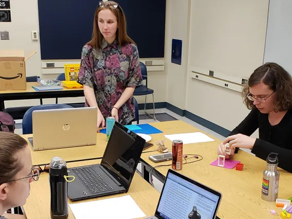 Students working with professor