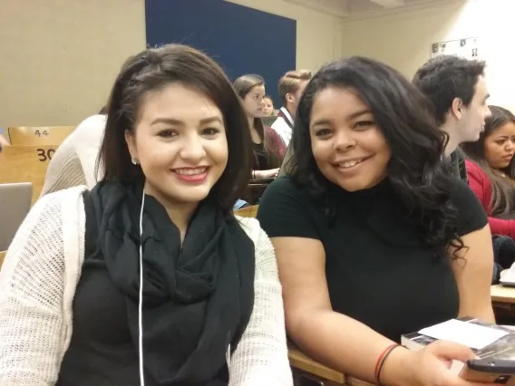 two students sitting together during a wildcat writers' lecture