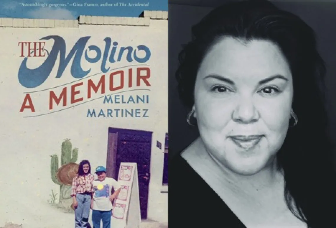 woman smiling next to book cover